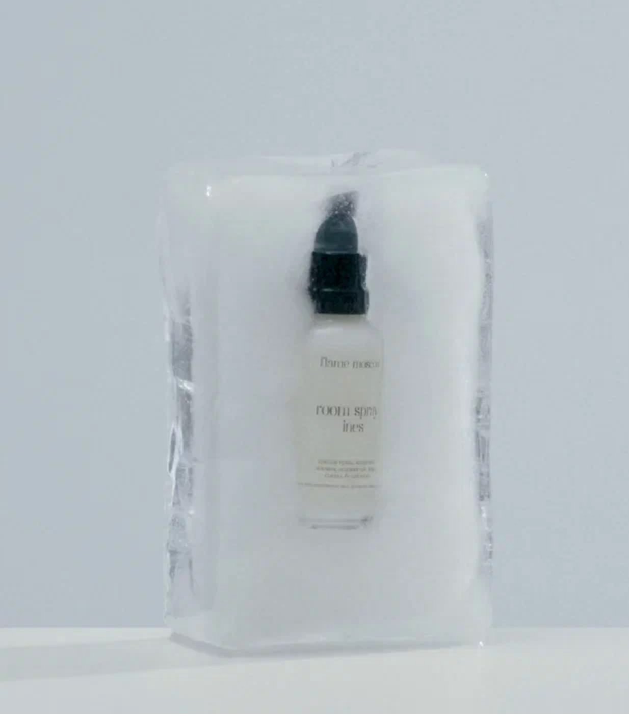 FLAME Moscow — room spray frozen in a block of ice, still from the cinema spot