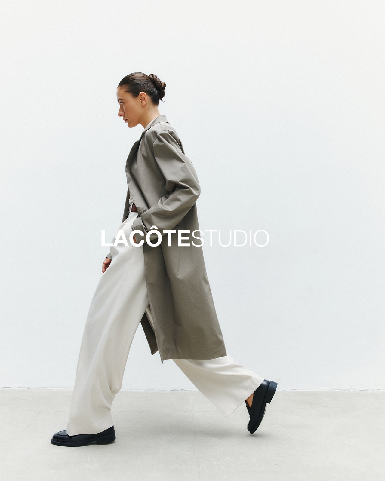LA CÔTE — lookbook, walking in a grey coat and white trousers