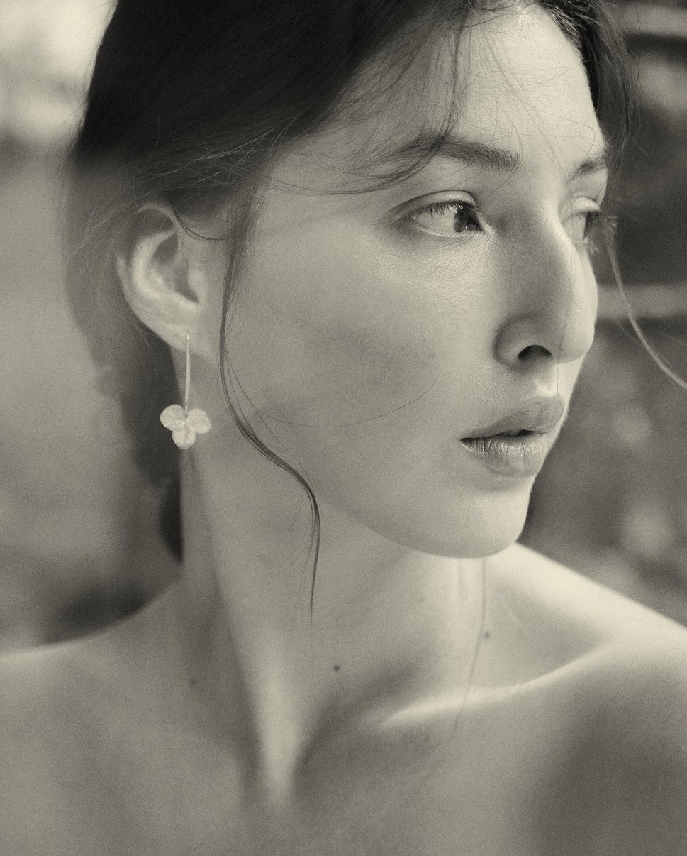 SHU SHA — sepia portrait with a hydrangea-petal earring